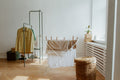 Wall mounted retractable clothes drying rack