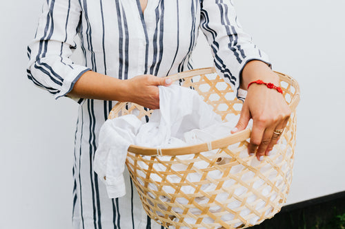 Bamboo laundry hamper lifestyle shot